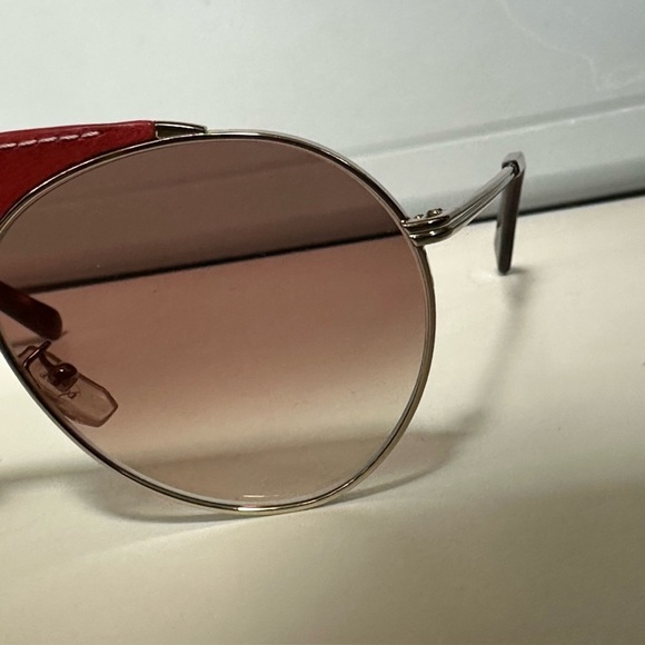 LOEWE Red Leather Sunglasses‎ Tortoise 
Plastic/Metal Women